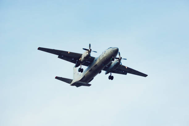 istock Freight military plane in the clear sky. 1190587074