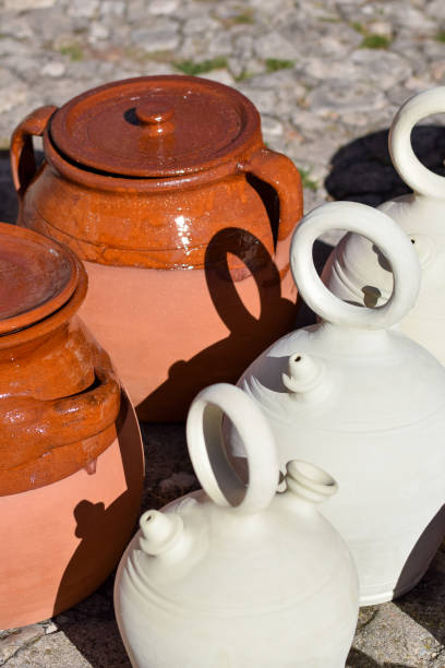 istock Earthenware pitchers and pots in a market in Spain. 1190587075