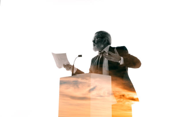 istock Speaker, coach or chairman during politician speech on white background 1190587402