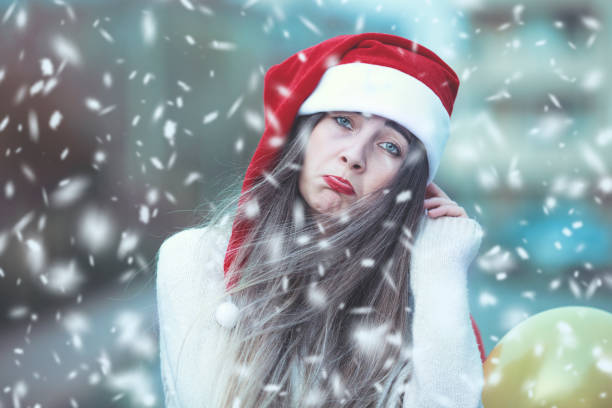 Woman wearing a white benny cap as beauty, and fashion. Merry Christmas and pleasant holidays. Beautiful blonde female smiling in a portrait while celebrating Christmas, New Year, and the winter holidays.