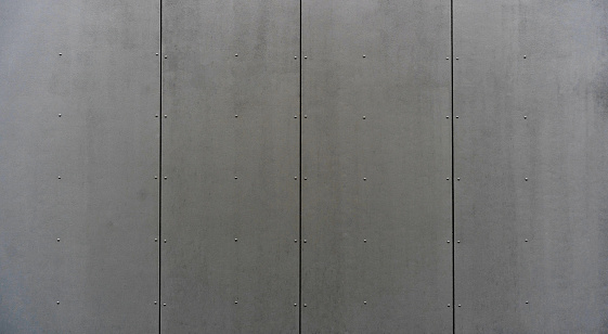 modern materials in the construction industry. Texture of metal cladding of a building facade closeup