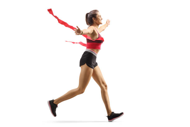 Female winner runner on the finish line