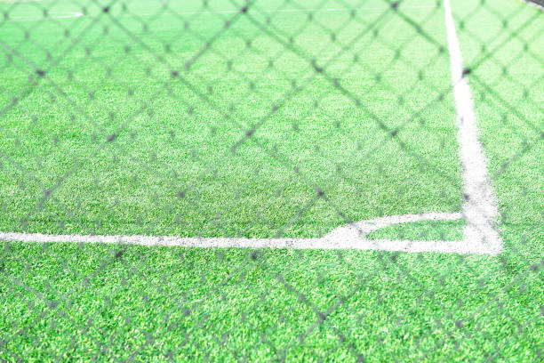 istock white line football corner on green field 1190592217