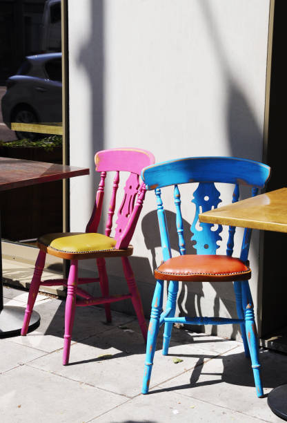 istock Wooden retro color chairs 1190595529