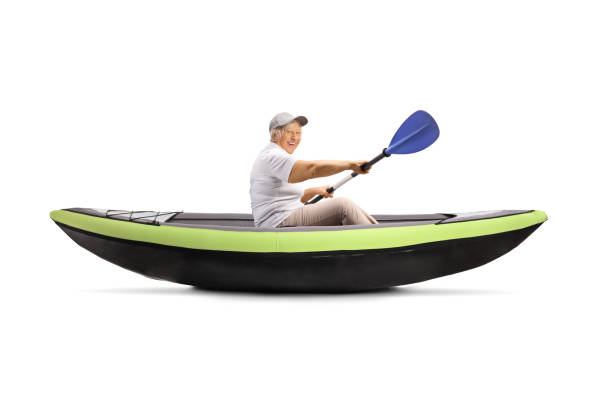 istock Happy senior lady in a kayak 1190600576