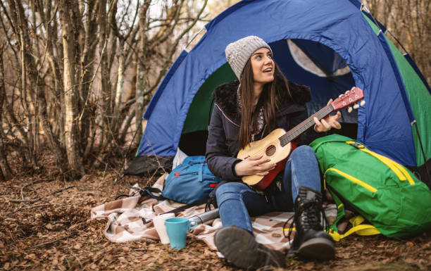 istock Young woman camping in nature 1190601205