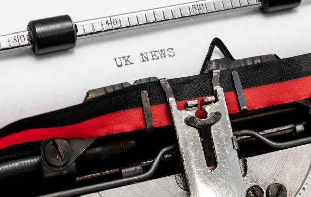 istock UK News on a classic typewriter 1190602338