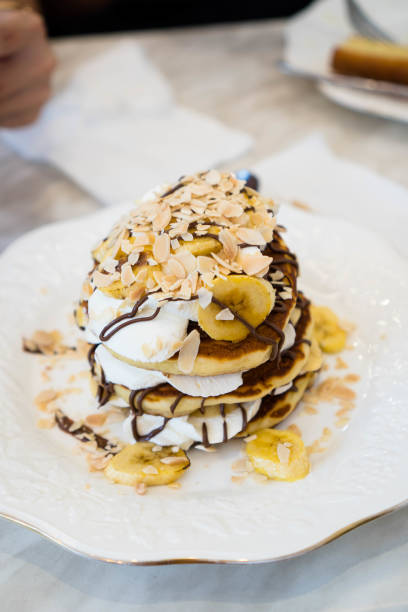 banana chocolate almond on fluffy soft pancake