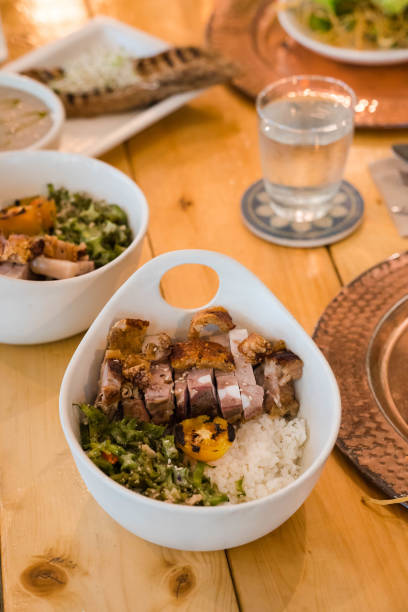 istock crispy pork belly with coconut vegetables rice bowl 1190603751