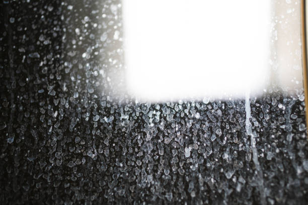a sliding door that is full of water stains