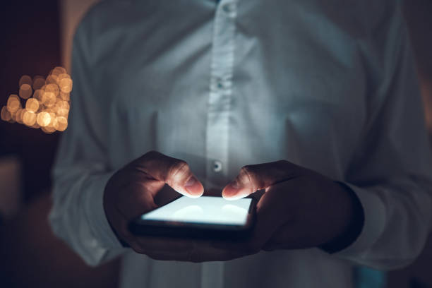 istock Close up of guy with modern smartphone 1190605301