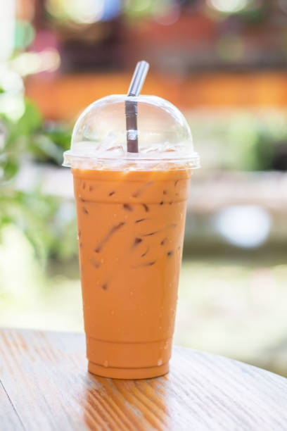 istock Milk tea on wooden floor. 1190605355