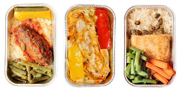 Set of three airline dishes  airplane food stock pictures, royalty-free photos & images