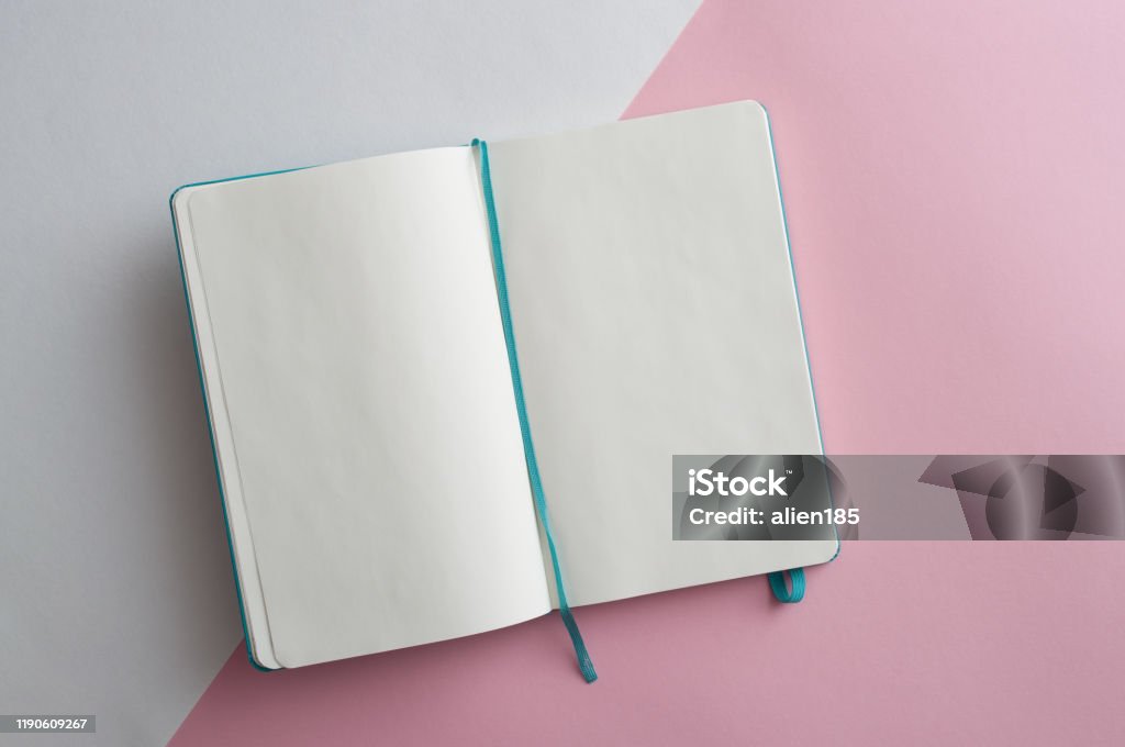 Minimalistic white and pink flat lay Minimalistic white and pink flat lay with blank notebook Note Pad Stock Photo