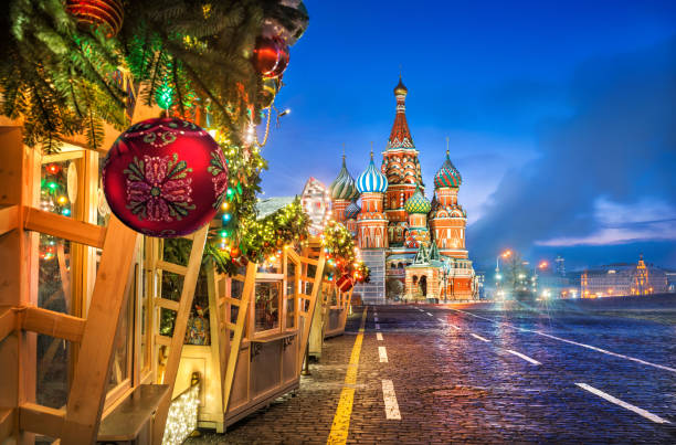 istock Christmas ball and St. Basil's Cathedral 1190615033
