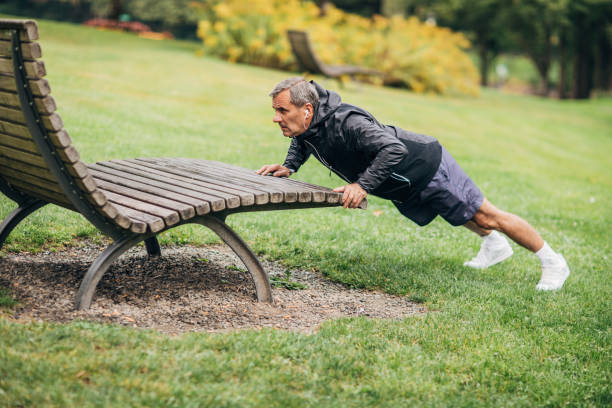 istock Senior man exercising in park 1190616565