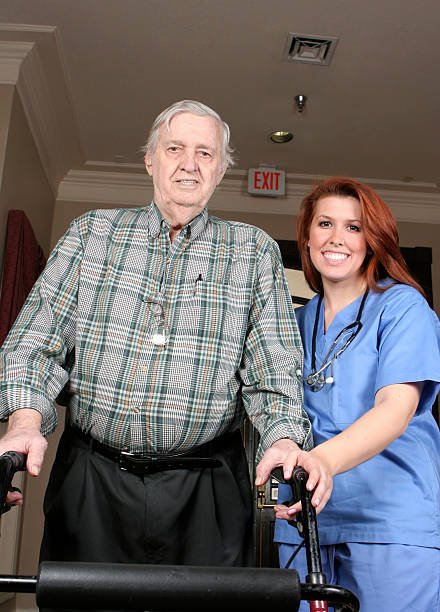 istock Senior With Smiling Nurse 119061834