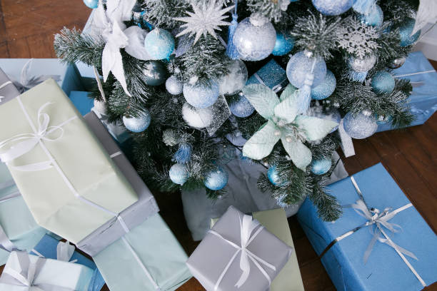 istock Blue and white Christmas decorations on the New Year tree in the home interior 1190622513
