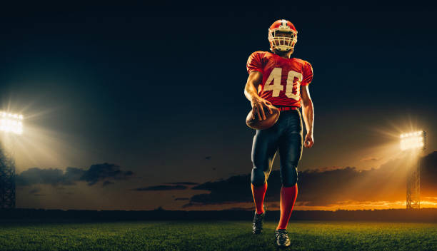 American football player in action American football player in action on a professional stadium Touchdown stock pictures, royalty-free photos & images