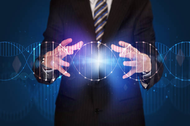istock Businessman holding DNA 1190629259