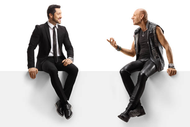 istock Punker and a businessman sitting on a panel and having a conversation 1190629273