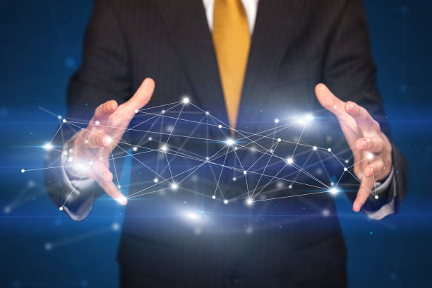 istock Businessman holding network connections 1190629432