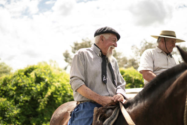istock Gauchos riding horses 1190629505