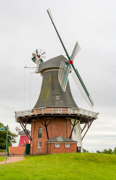 istock twin windmills in Greetsiel 1190631886