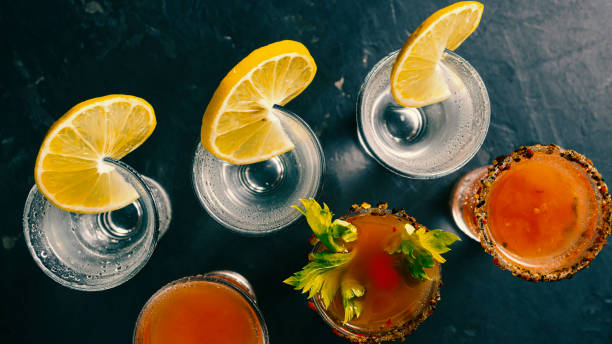 cocktail tequila, cocktail whiskey, drink bottle, dark background, bar counter, bartender guide