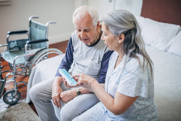 istock Senior couple arranging pill box 1190638018