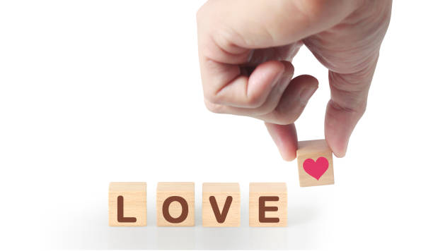 istock Concept creative idea and innovation. wooden cube block in hand 1190638736