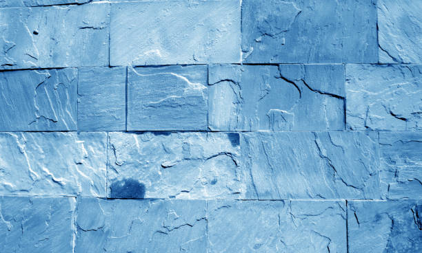 istock Sand stone wall in navy blue tone. 1190640419