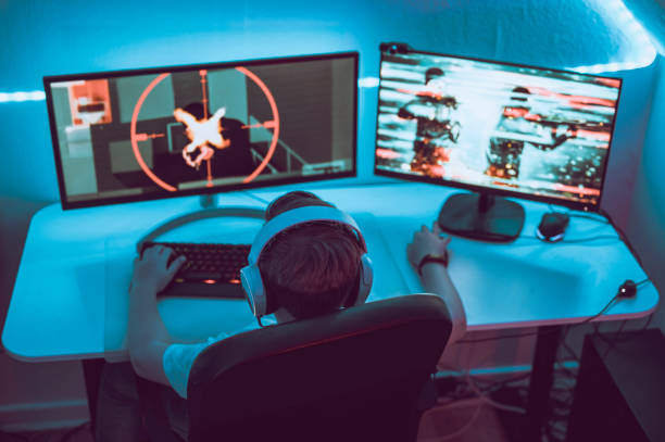 istock Esport gaming at home with headset and large computer setup 1190641379