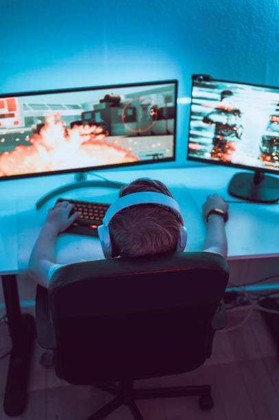 istock Child enjoys video game entertainment on computer screen 1190641565