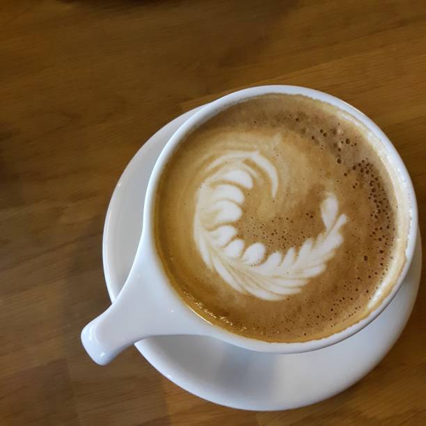Latte with elegant coffee design