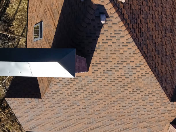 istock Bituminous tile for a roof. House with a roof from a bituminous 1190643225