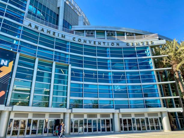 The exterior of the Anaheim Convention Center with people exiting the building.  Taken in Anaheim, Orange County, USA