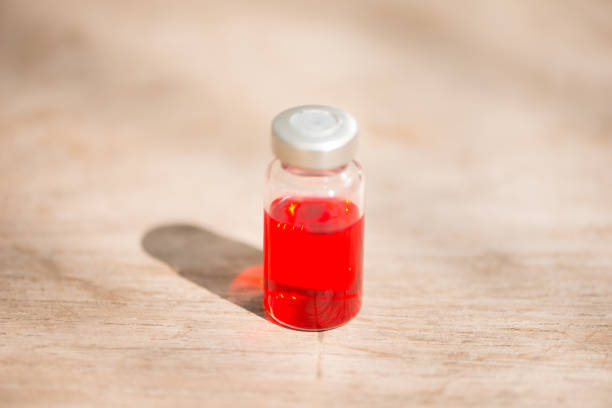 istock Injection vials show medicine background 1190644560