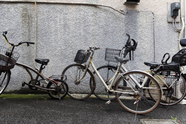 istock Old bicycles against a house exterior wall. 1190644942