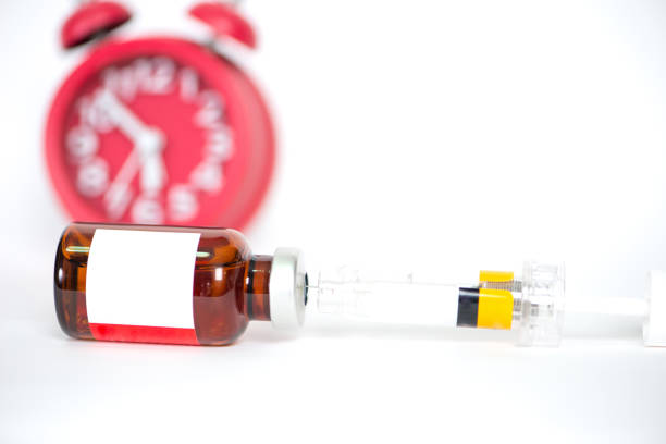 istock Injection vials show medicine background 1190645023