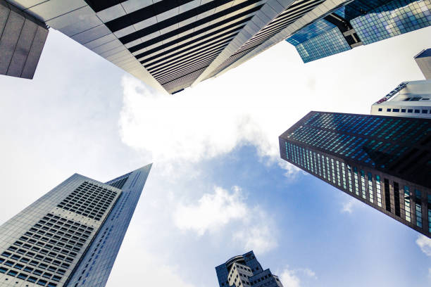 istock Bottom view of Skyscraper and blue sky background 1190645674