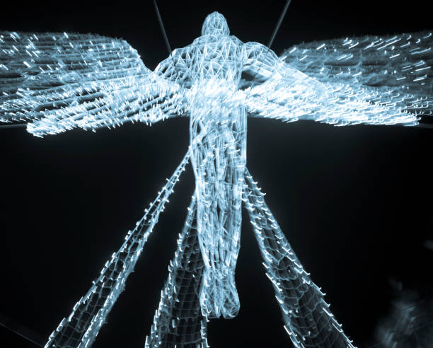 These are the 2019 Regent Street Christmas lights in the form of angels strung across the street. London, England, UK