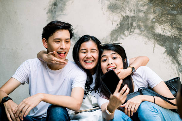 istock Group of Happy Friends Taking Selfie 1190649487
