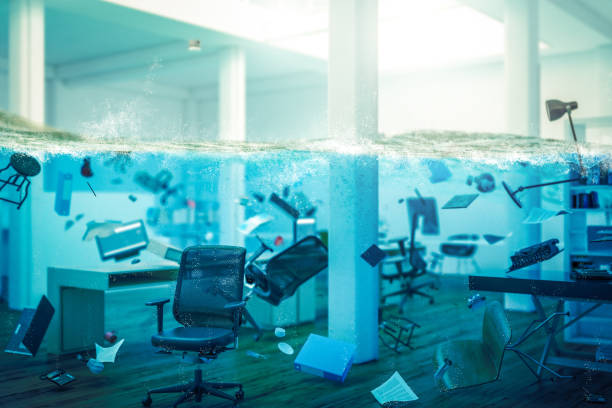 interior of an office completely flooded interior of an office completely flooded, objects floating in water and selective focus on a chair. 3d image render. concept of problems at work. water crisis stock pictures, royalty-free photos & images