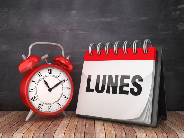 istock LUNES Calendar with Alarm Clock - Spanish Word - Chalkboard Background - 3D Rendering 1190651198