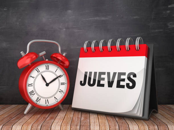 istock JUEVES Calendar with Alarm Clock - Spanish Word - Chalkboard Background - 3D Rendering 1190651754