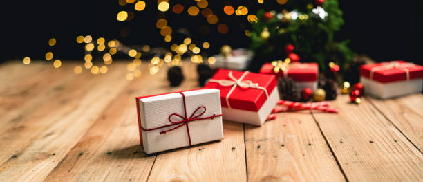 istock Christmas gift- Pine cones and branches  On the wood 1190651824