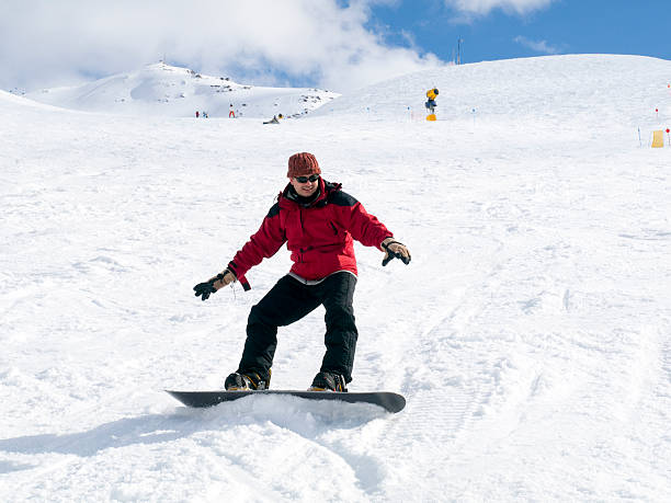 istock Snowboarder enjoying in the snow 119065183