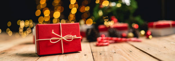 istock Christmas gift- Pine cones and branches  On the wood 1190651885
