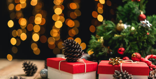 istock Christmas gift- Pine cones and branches  On the wood 1190651890